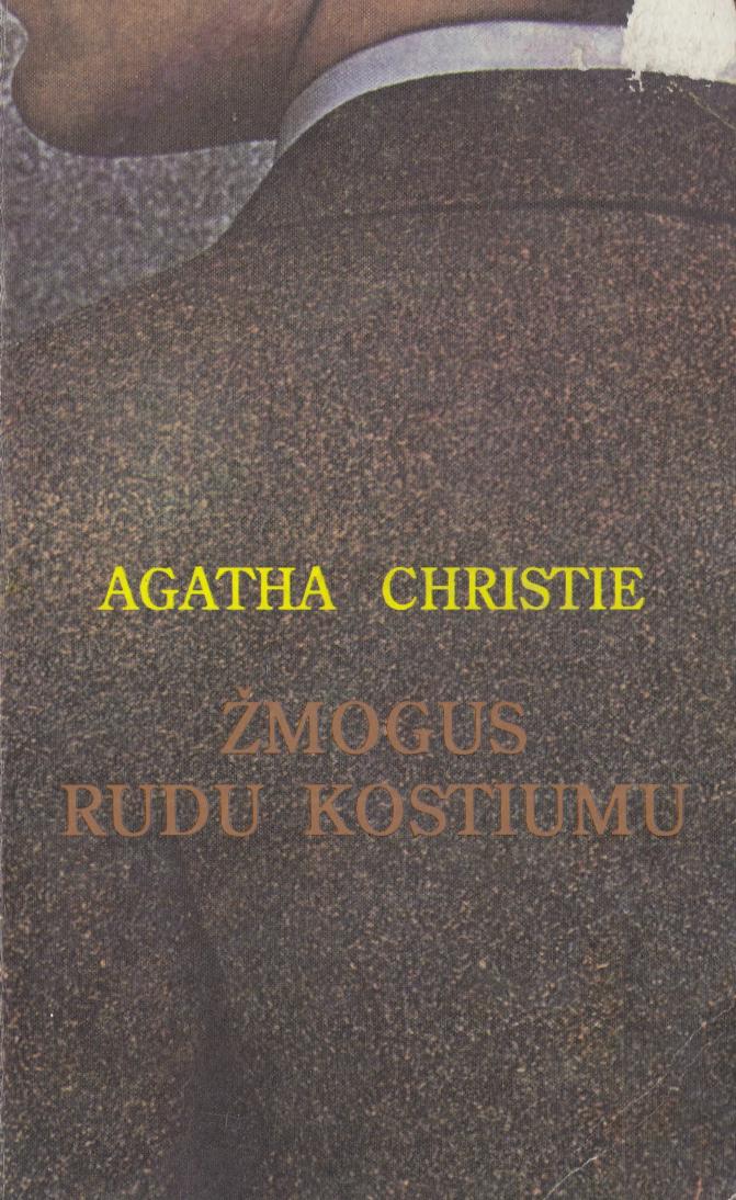 Zmogus rudu kostiumu